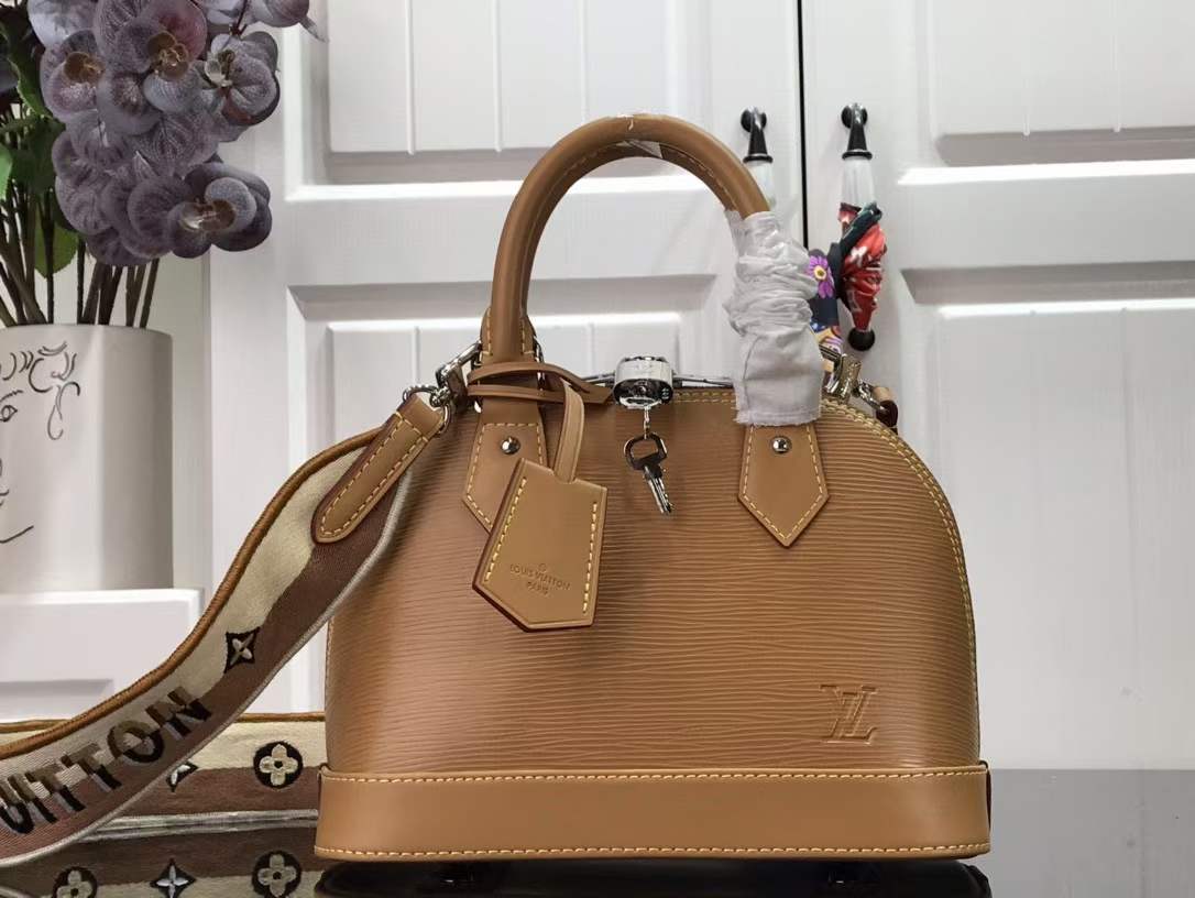 Louis Vuitton Alma Epi Gold Honey With Jacquard Strap 21 Louisvuitton 006 459 00 Atelier Elegant